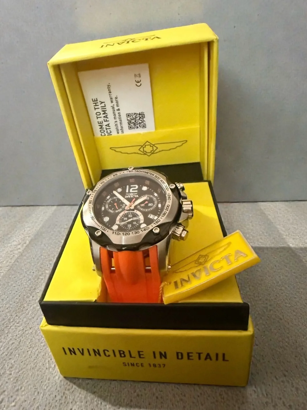 Invicta Speedway Swiss Ronda Orange Silicone Strap Black Dial Chronograph Watch